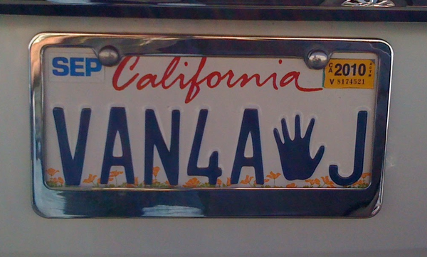 A close-up photo of a California license plate that says 